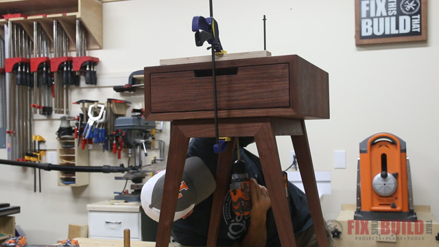 attaching the end table top to the base