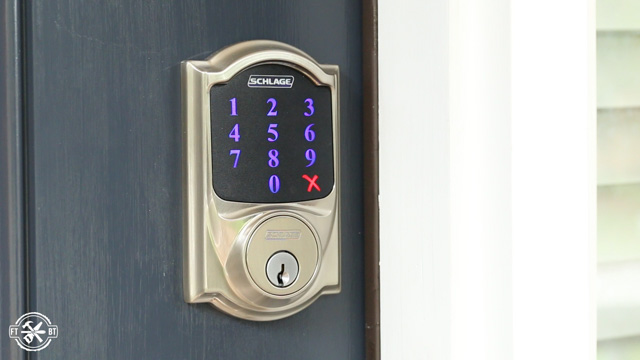 keyless lock on front door with red x