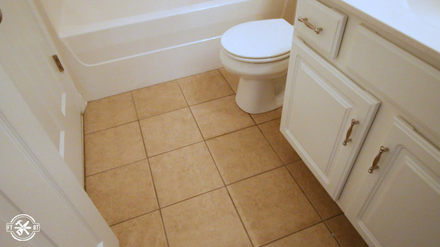 old tile floor in small bathroom