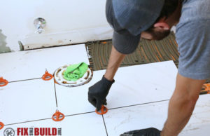 how to tile a bathroom floor with leveling spacers