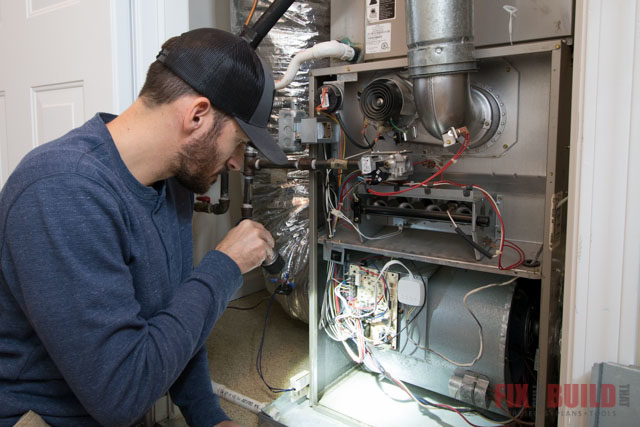 Inspecting a Furnace for Rust Inspecting a Furnace for Rust