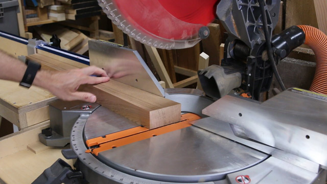 cutting wood with miter saw