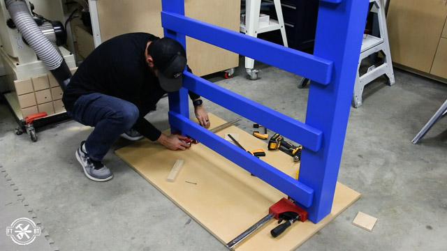 attaching clamps to base of loft bed