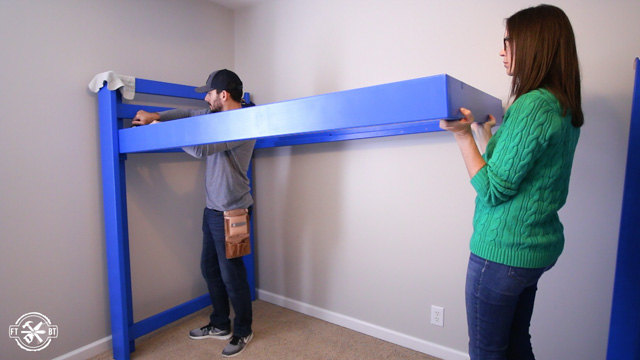 assembling loft bed in room