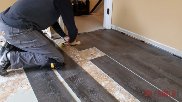 laying vinyl plank flooring