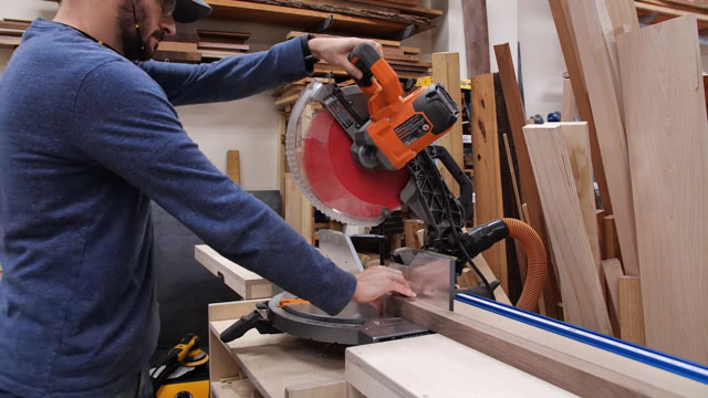 Cutting wood with miter saw
