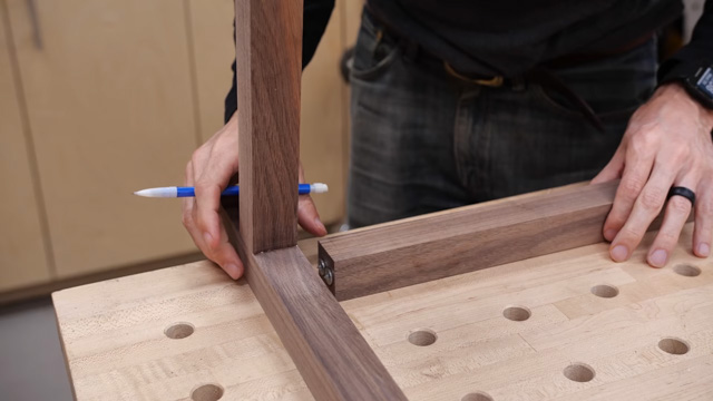 Using dowel points to mark wood for holes