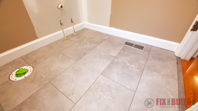 grey vinyl plank flooring in a bathroom