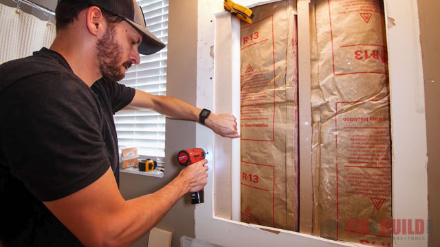 adding scrap wood to drywall opening