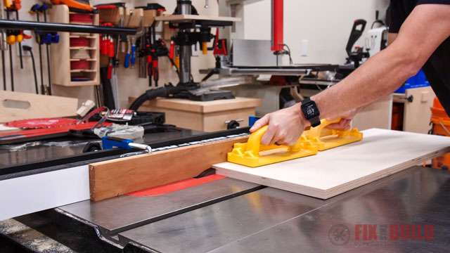 Cutting plywood on table saw 