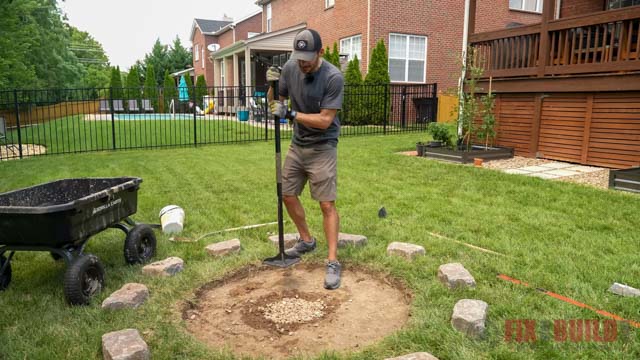 tamp down rocks in drainage hole