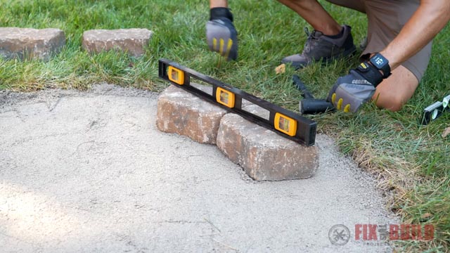 checking fire pit stones are level