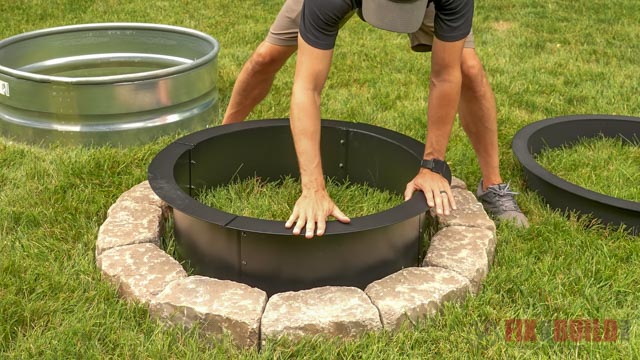 test fitting fire pit ring inside DIY stone fire pit